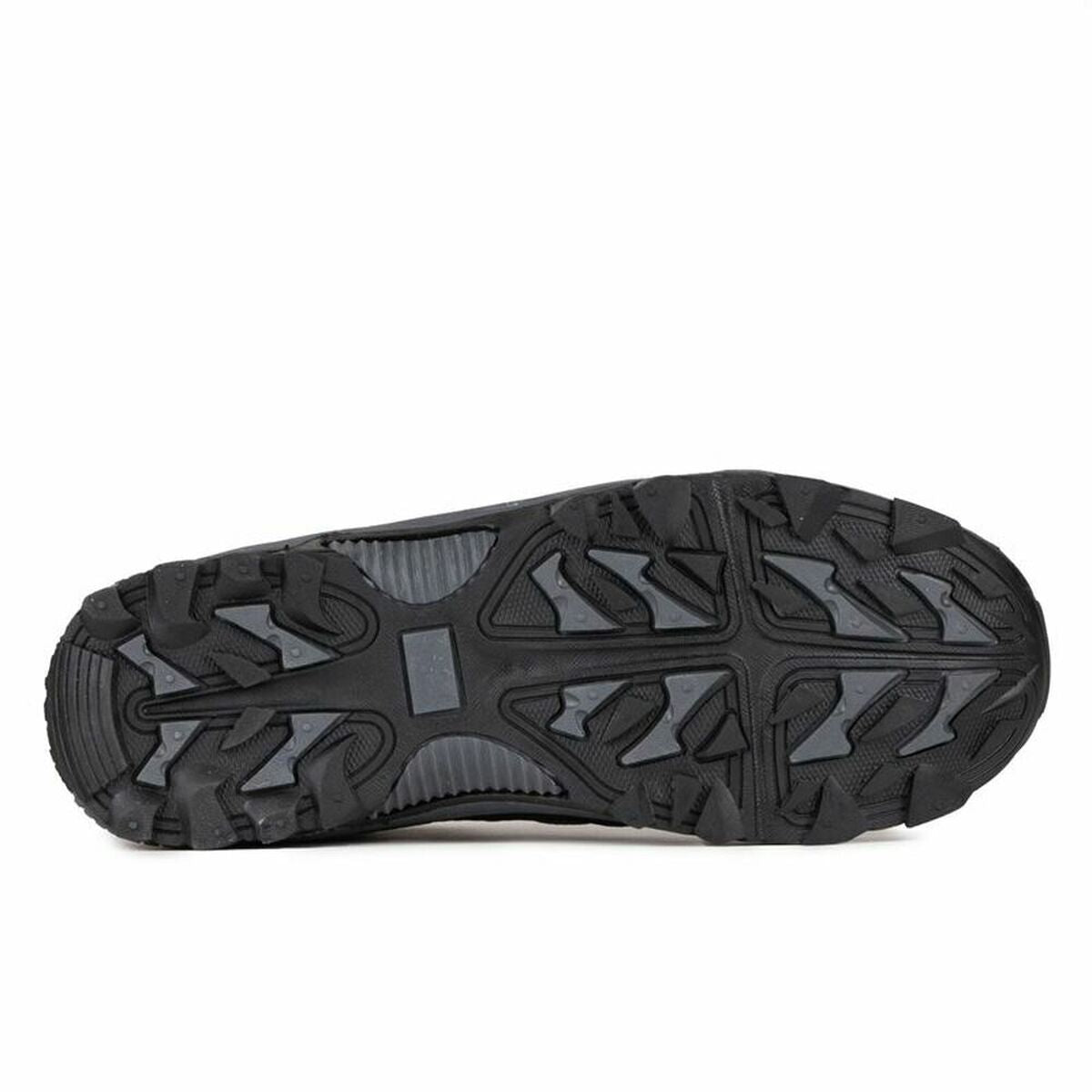 Close-up of the Geographical Norway hiking shoe, showing rugged, multi-directional tread pattern for grip.